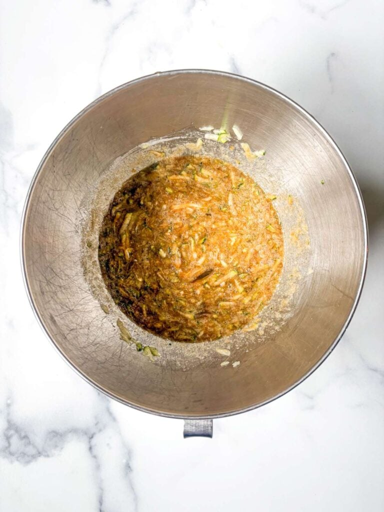 sourdough zucchini bread wet batter in mixing bowl